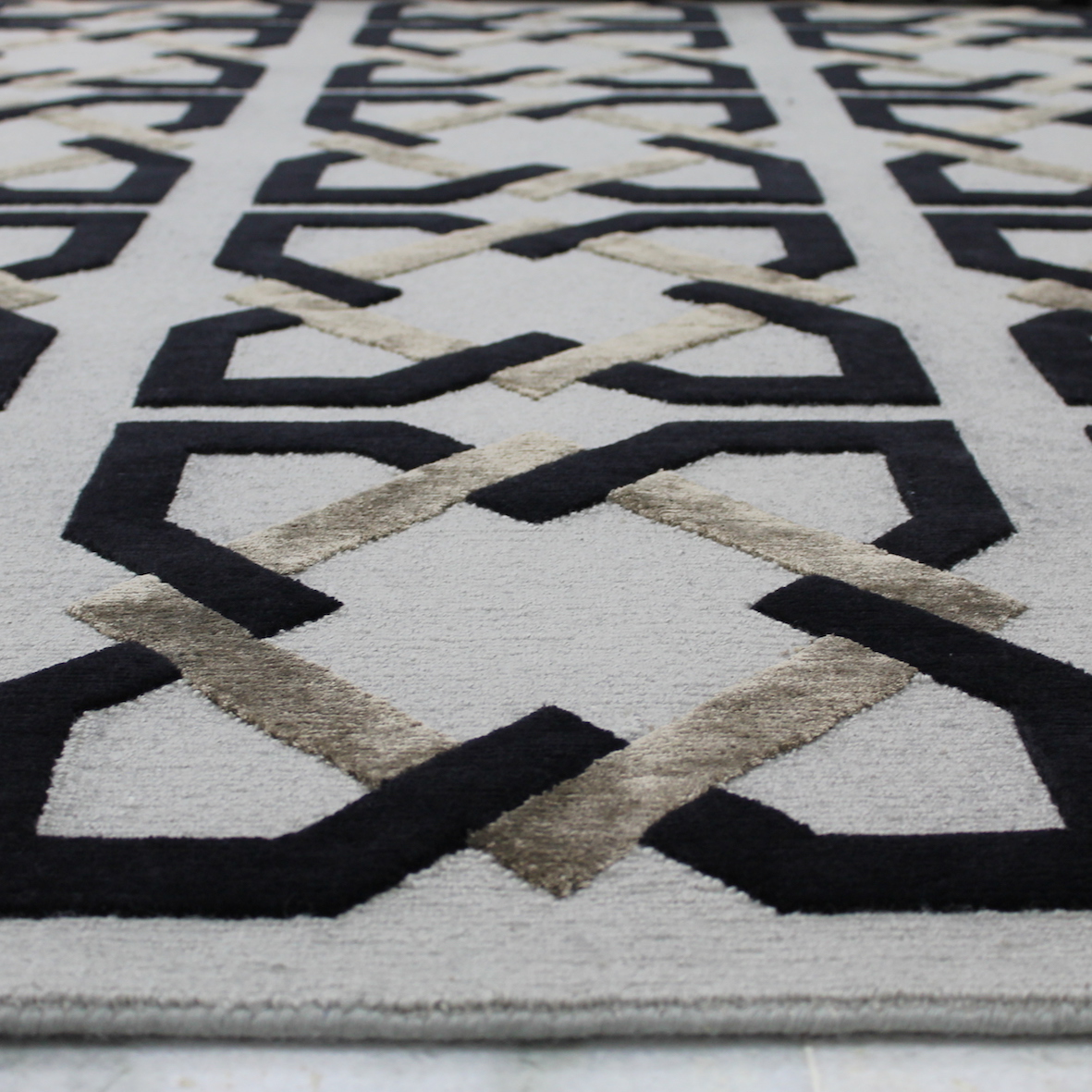 Black geometric rug